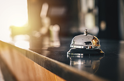 shot of front desk bell at hotel