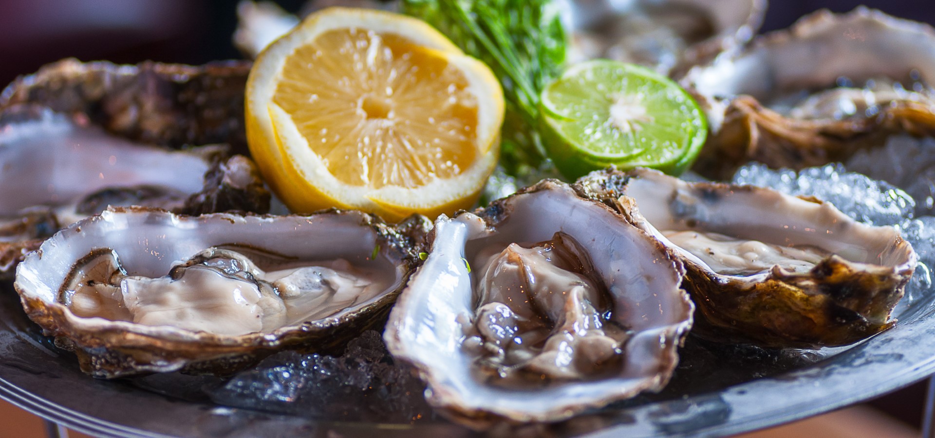 A decorated dish containing oysters