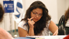 Young female student prepares for class